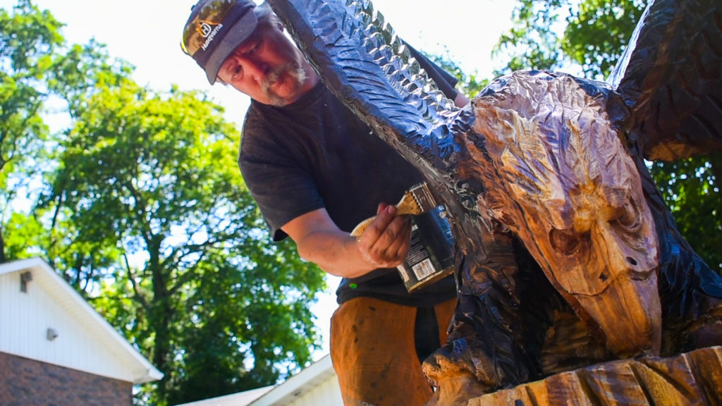 Paul putting sealer on the Bald Eagle